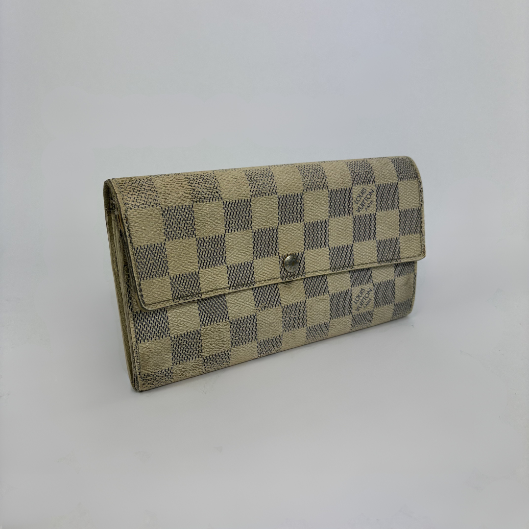 Louis Vuitton wallet on white background