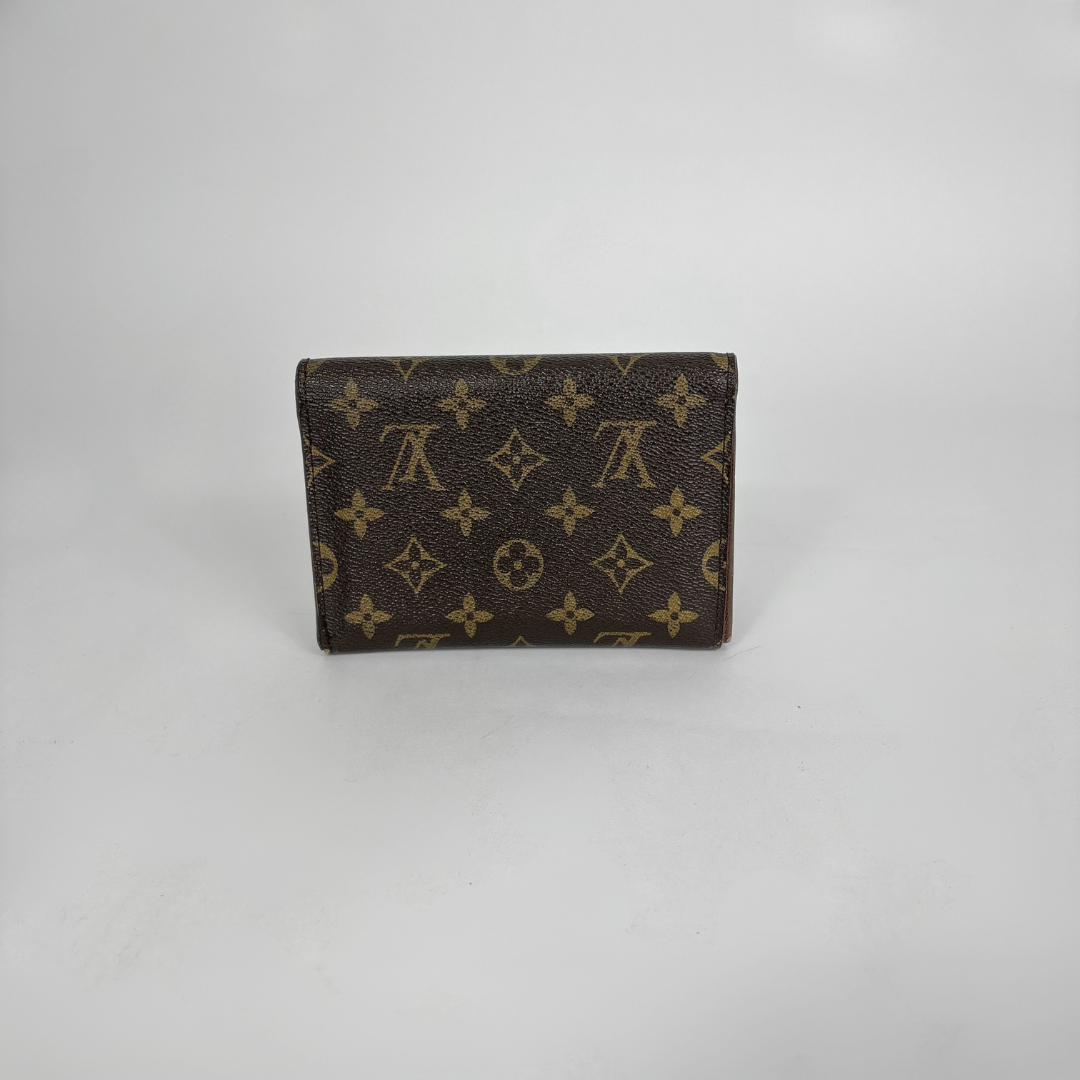 Louis Vuitton Wallet International on a white background