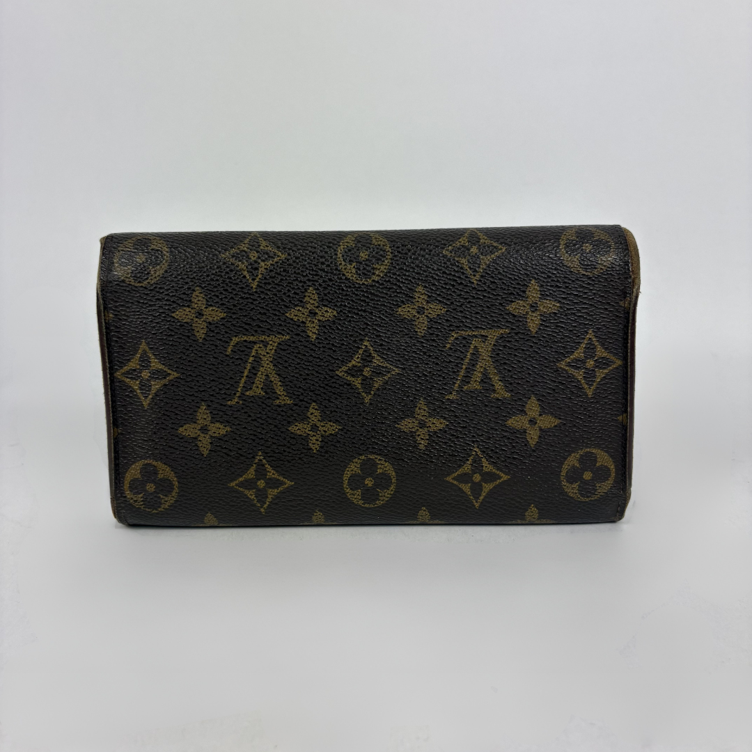 Louis Vuitton wallet on white background