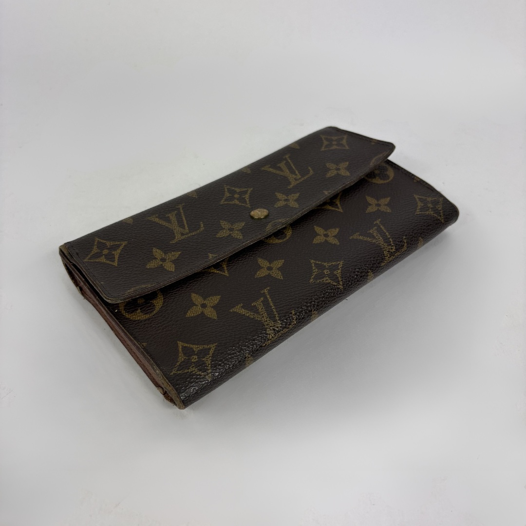 Louis Vuitton wallet on white background