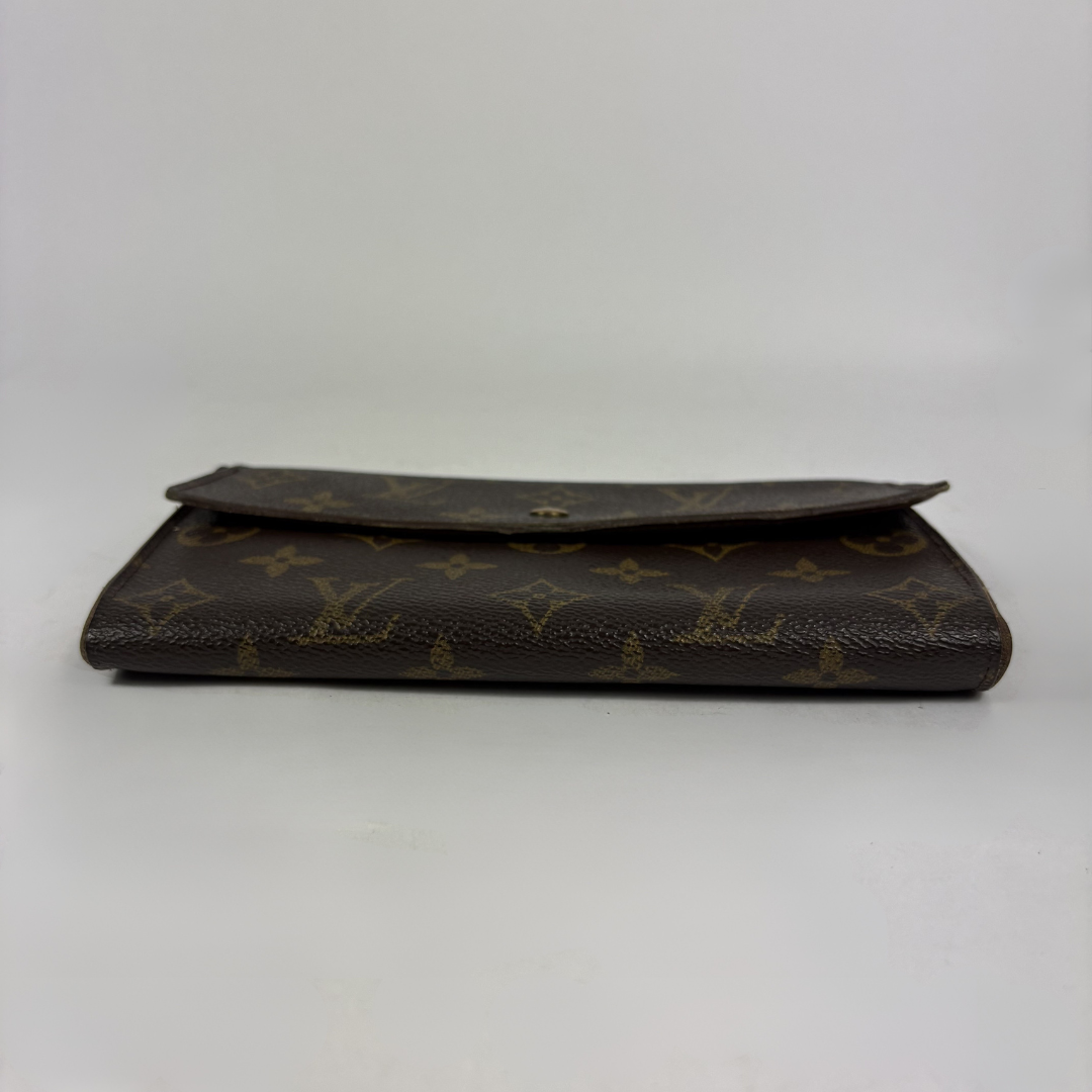 Louis Vuitton wallet on white background