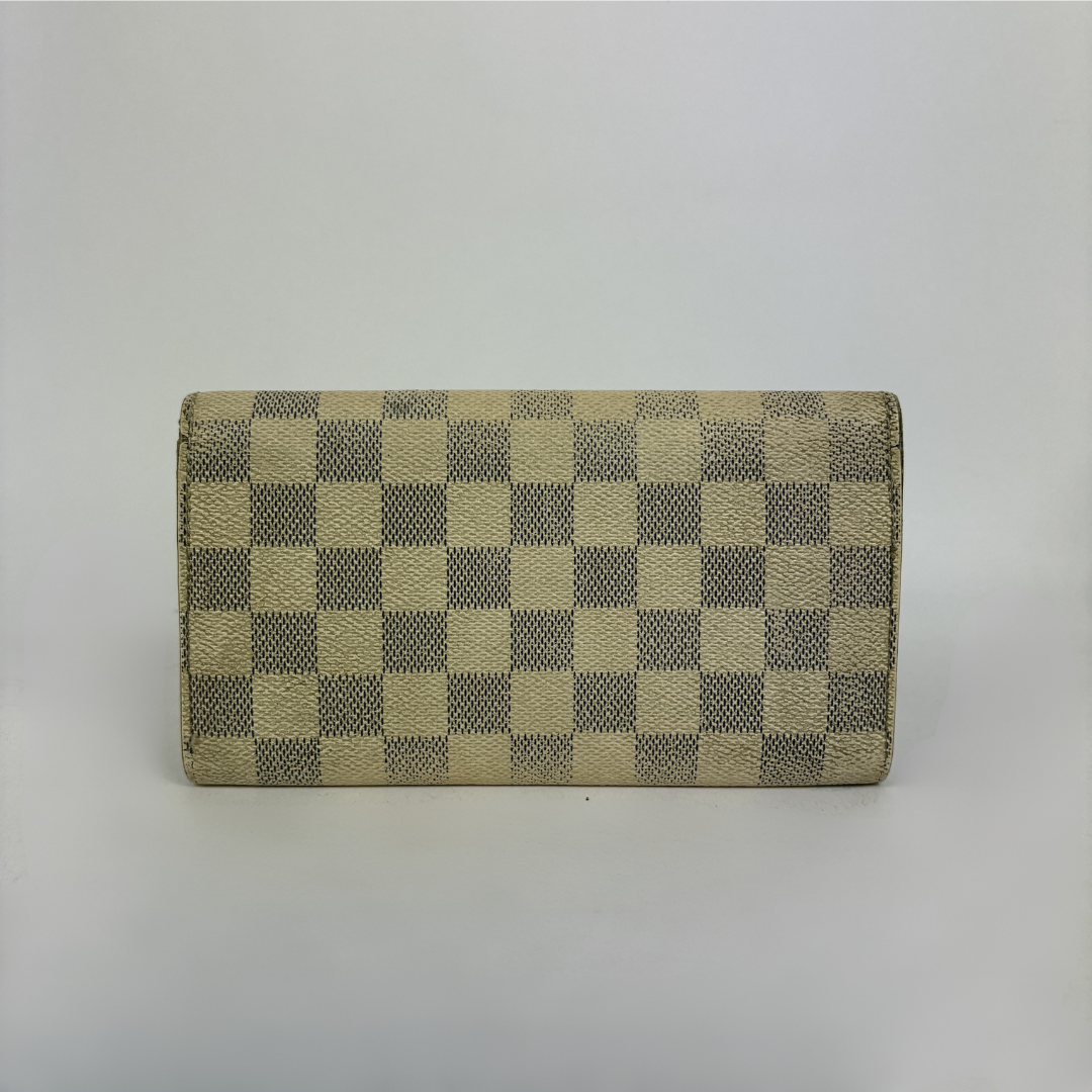 Louis Vuitton wallet on white background