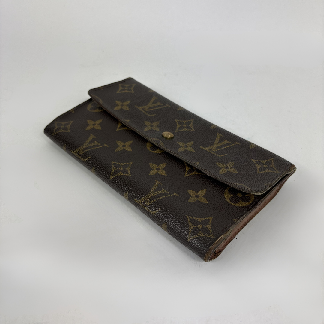 Louis Vuitton wallet on white background