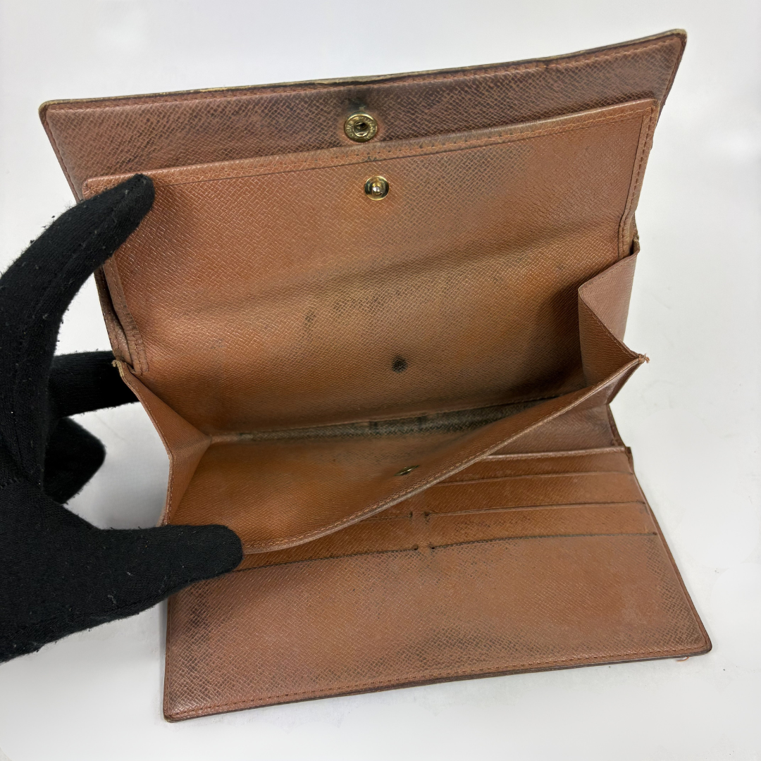 Louis Vuitton wallet on white background