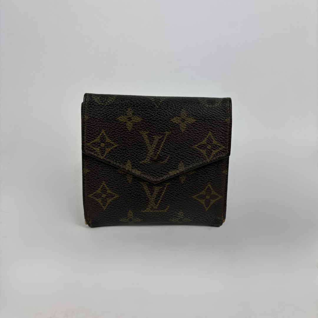 Louis Vuitton Druk Wallet on a white background