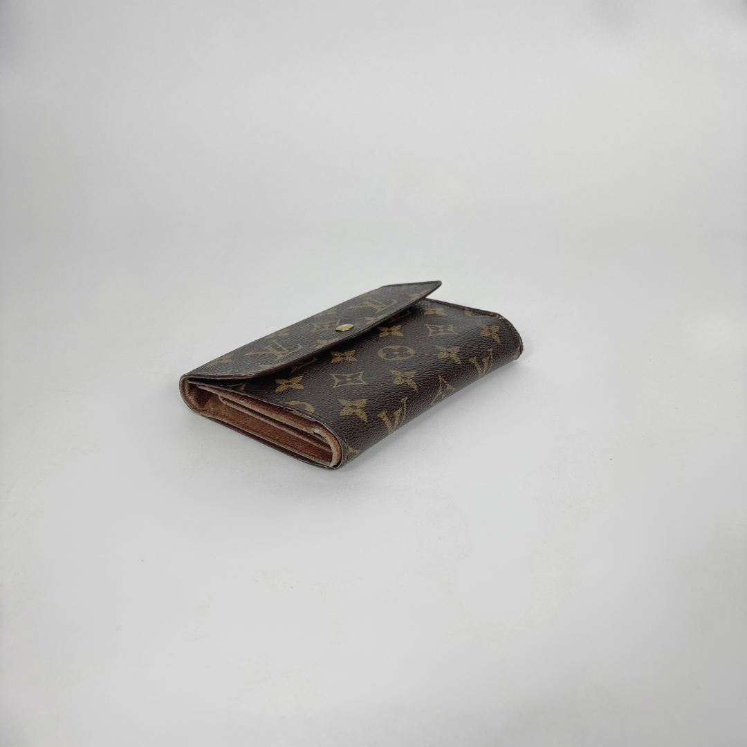 Louis Vuitton Wallet International on a white background
