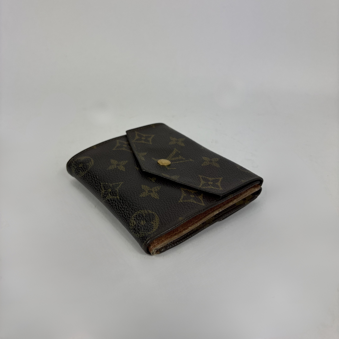 Louis Vuitton Druk Wallet on a white background