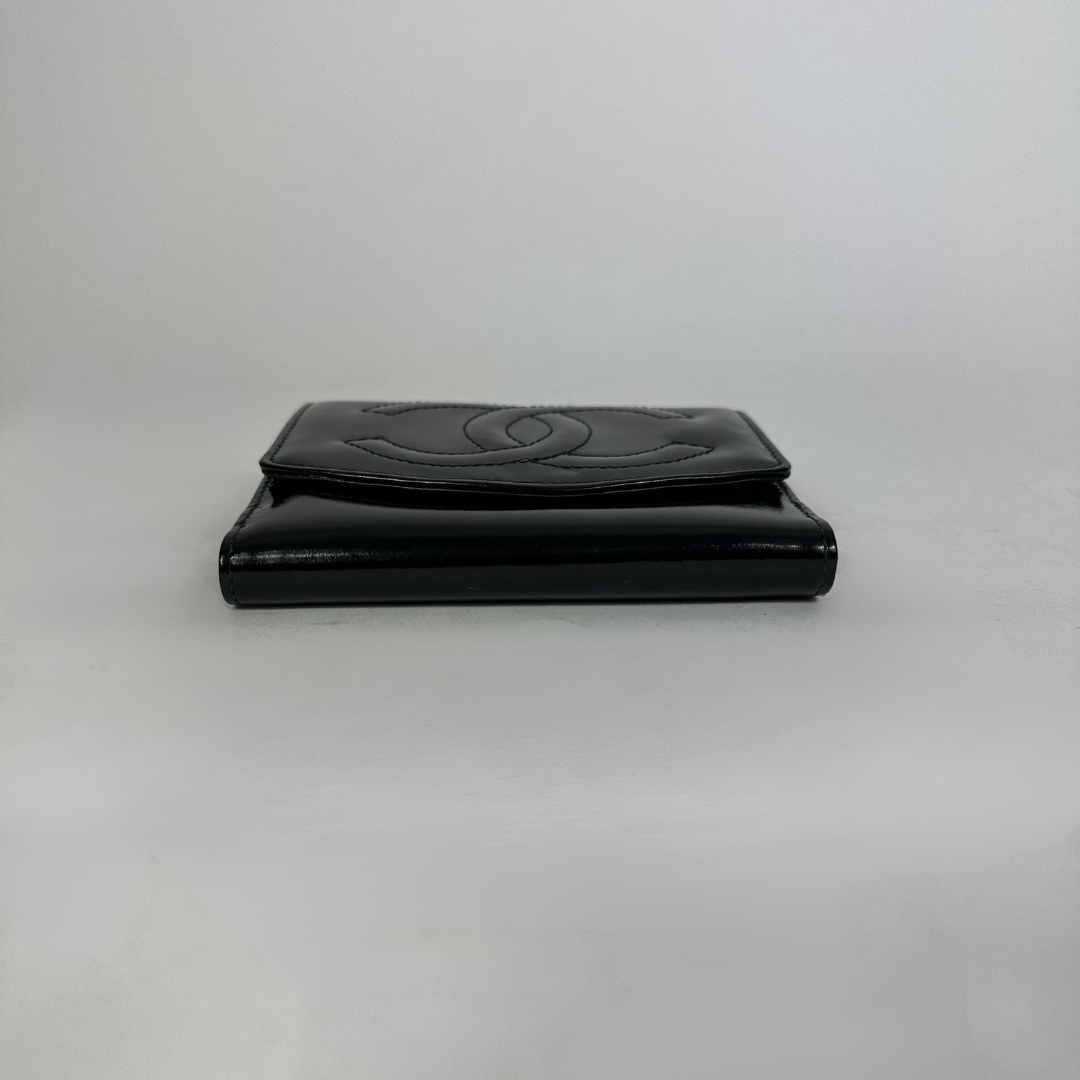 Black Chanel wallet on white background