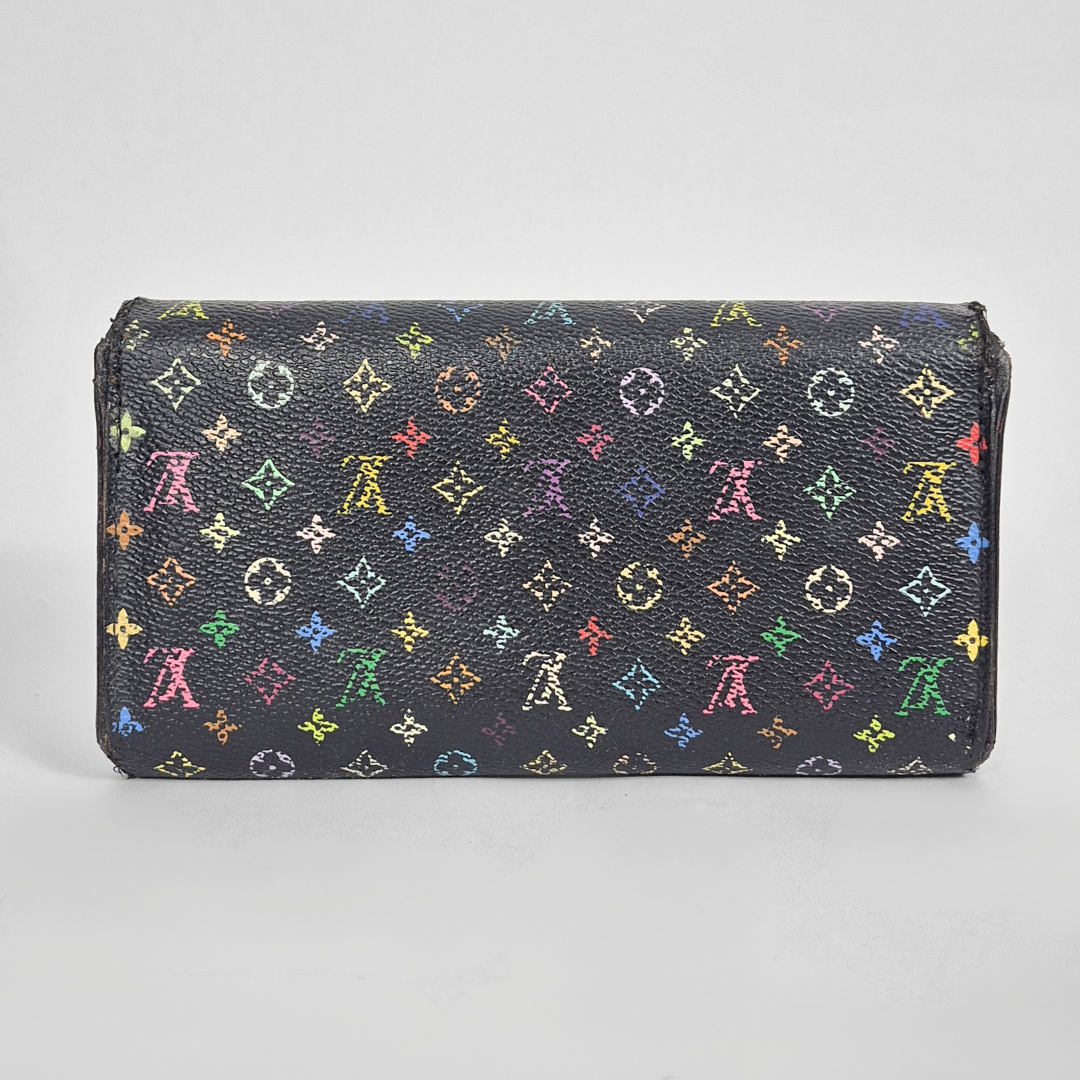 Multicolored patterned wallet on a light gray background