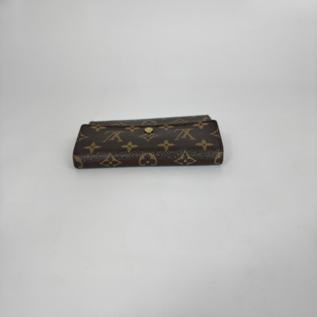 Louis Vuitton Wallet International on a white background