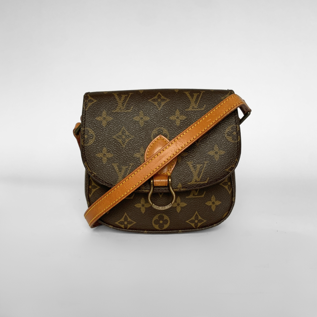 Louis Vuitton monogram handbag on a light gray background