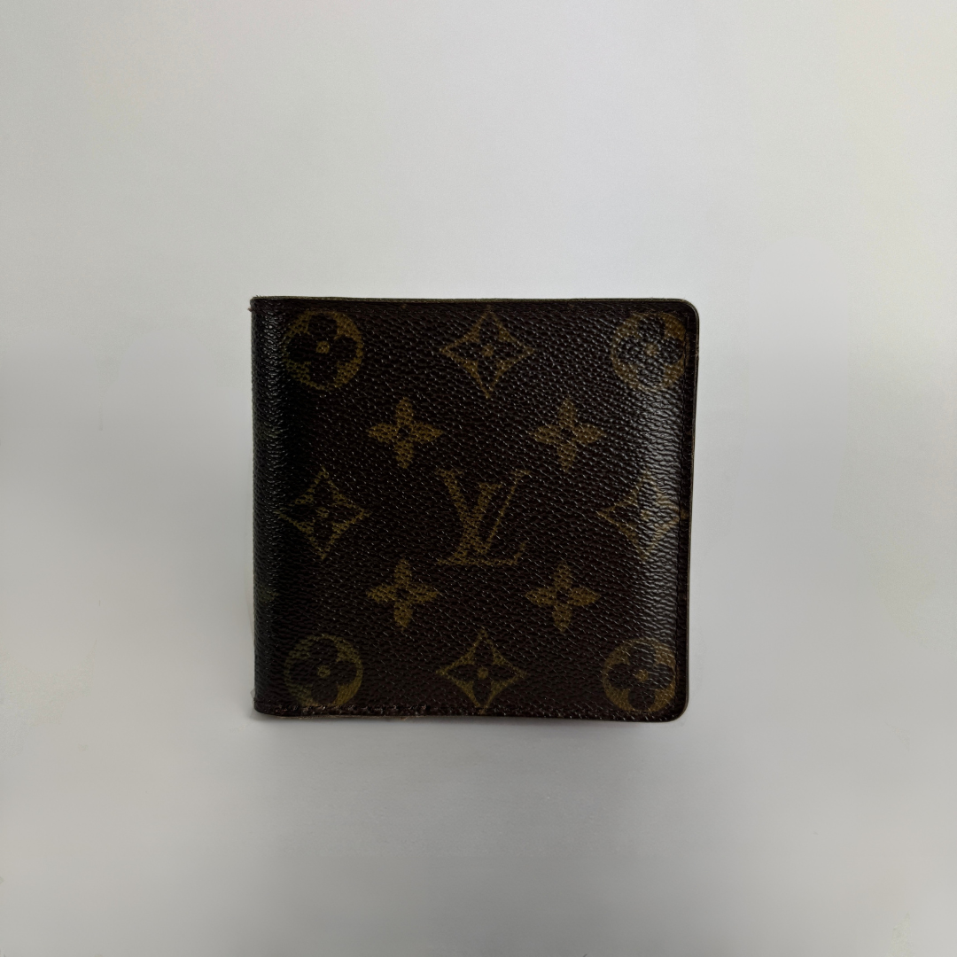 Louis Vuitton Flap Wallet on a white background
