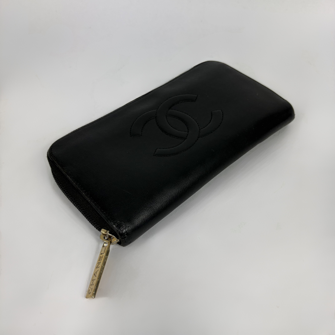 Black Chanel Wallet on white background