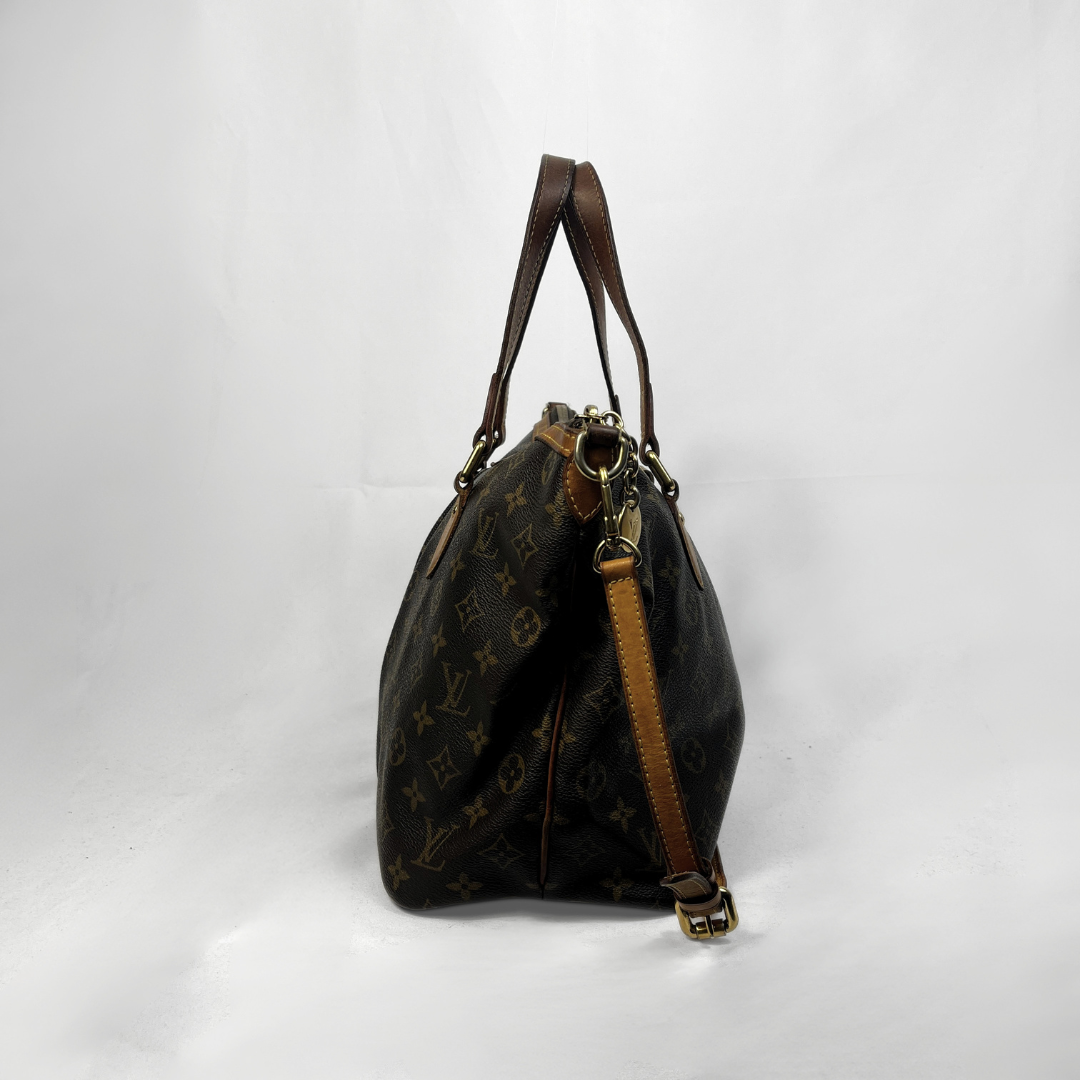 A Louis Vuitton monogram canvas shoulder bag in dark brown with tan leather straps and gold-tone hardware, photographed against a white studio background.