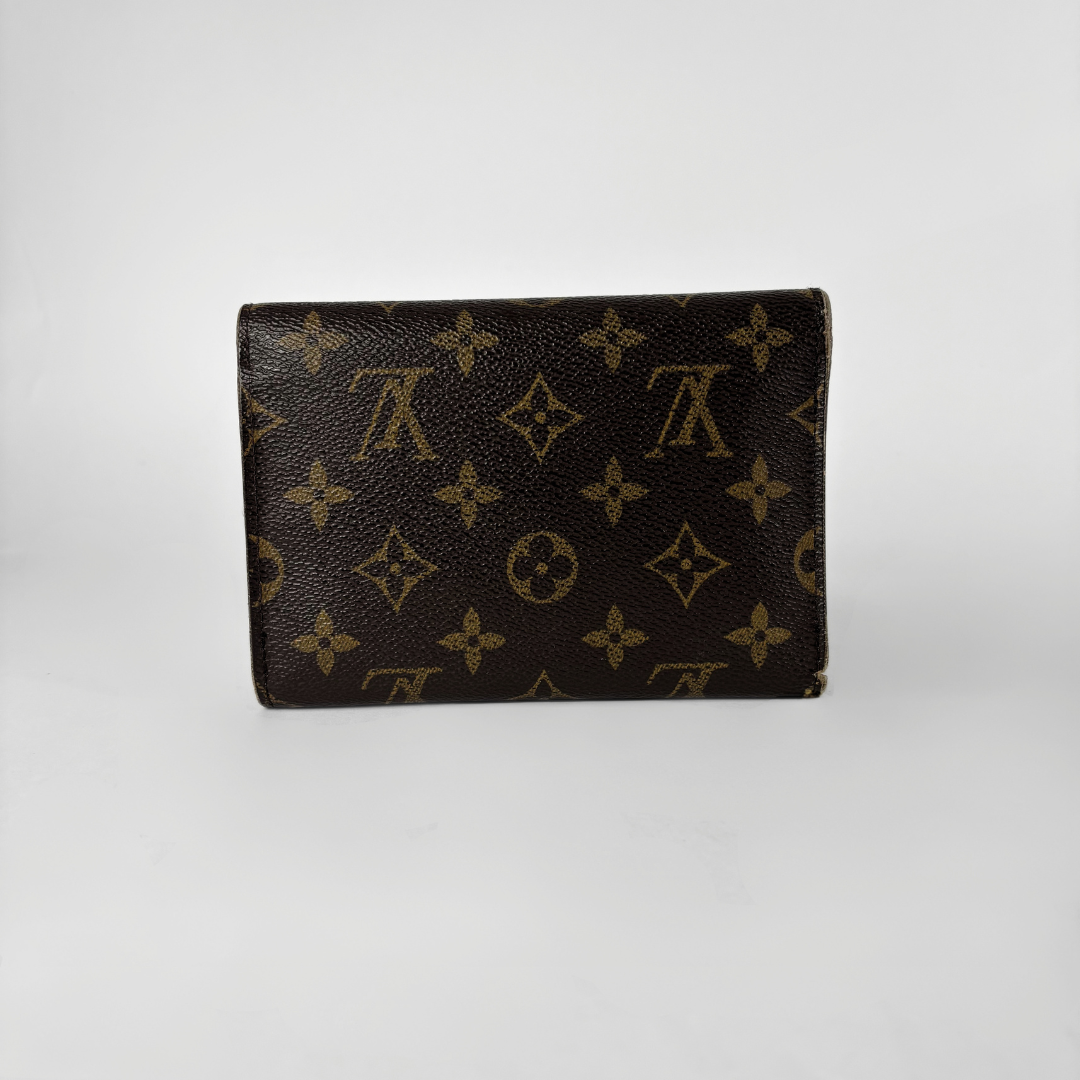 Louis Vuitton International Wallet Medium on a white background