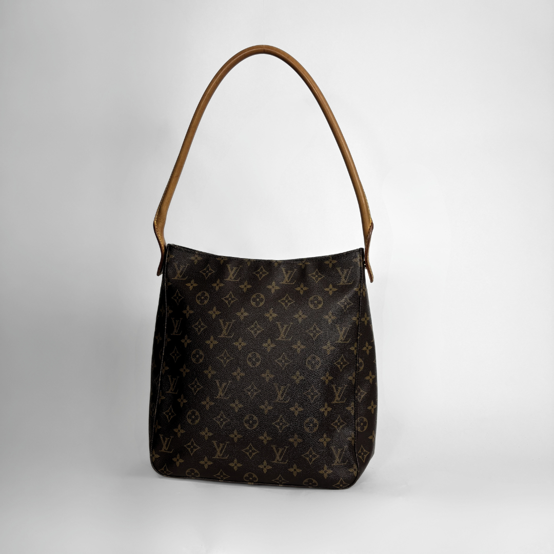 Louis Vuitton monogram canvas shoulder bag with a brown leather shoulder strap, shown on a light gray background.