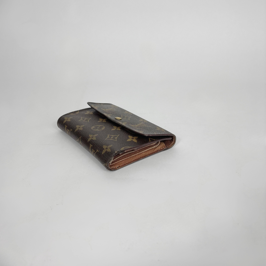 Louis Vuitton Wallet International on a white background