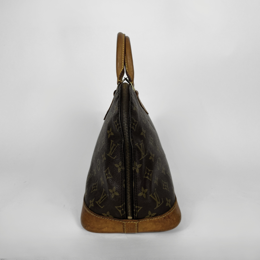Louis Vuitton Alma Monogram Canvas on a white background