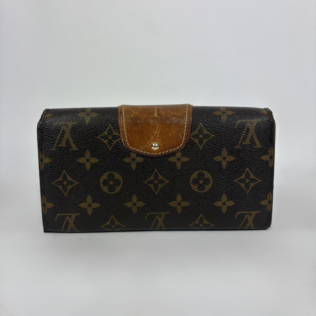 Louis Vuitton Wallet in front of white background