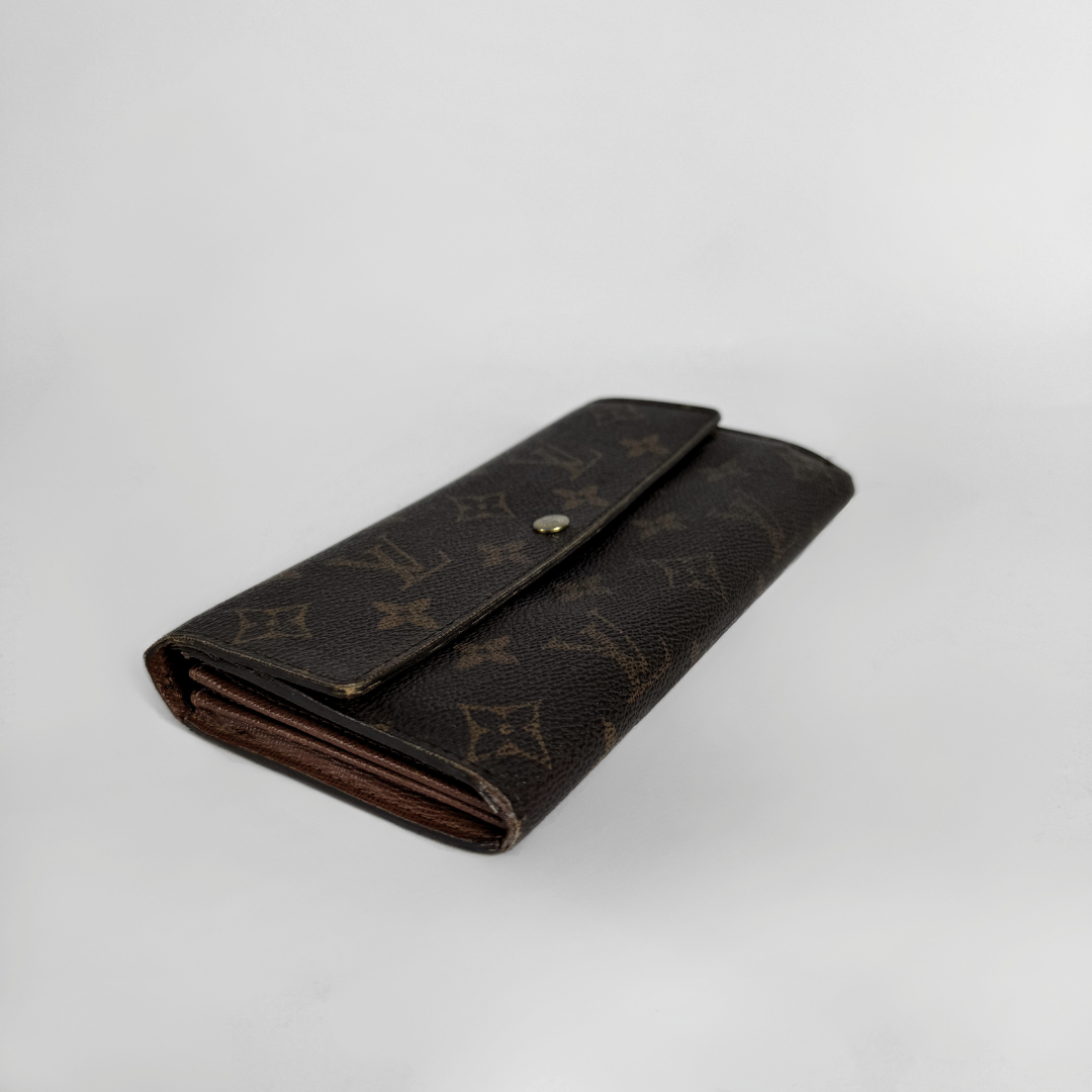 Louis Vuitton wallet on white background