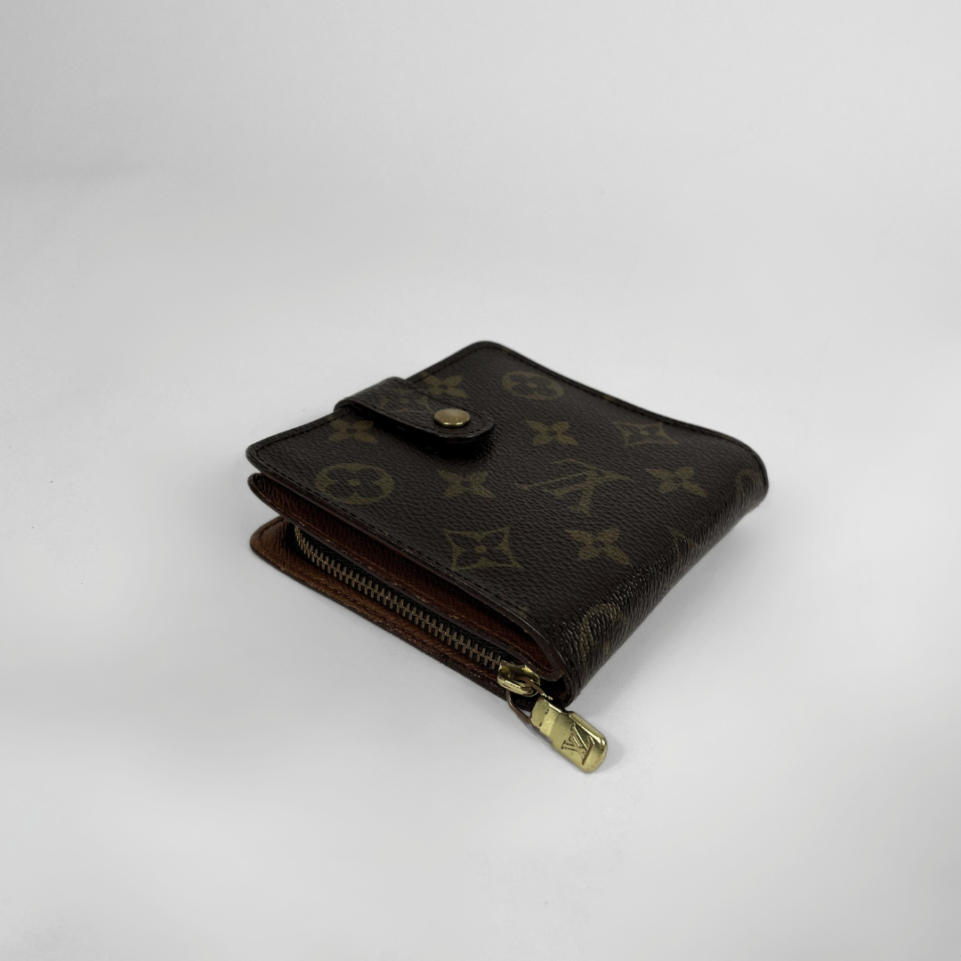 Louis Vuitton Zipper Wallet on a white background