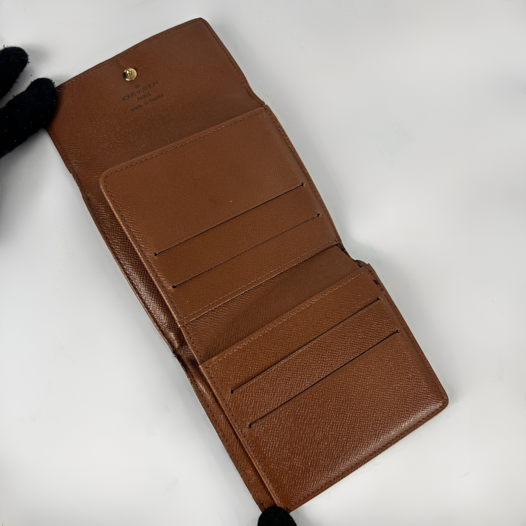 Louis Vuitton Druk Wallet on white background