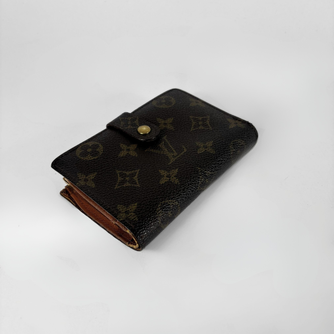 Louis Vuitton Monogram Clip Wallet on a white background