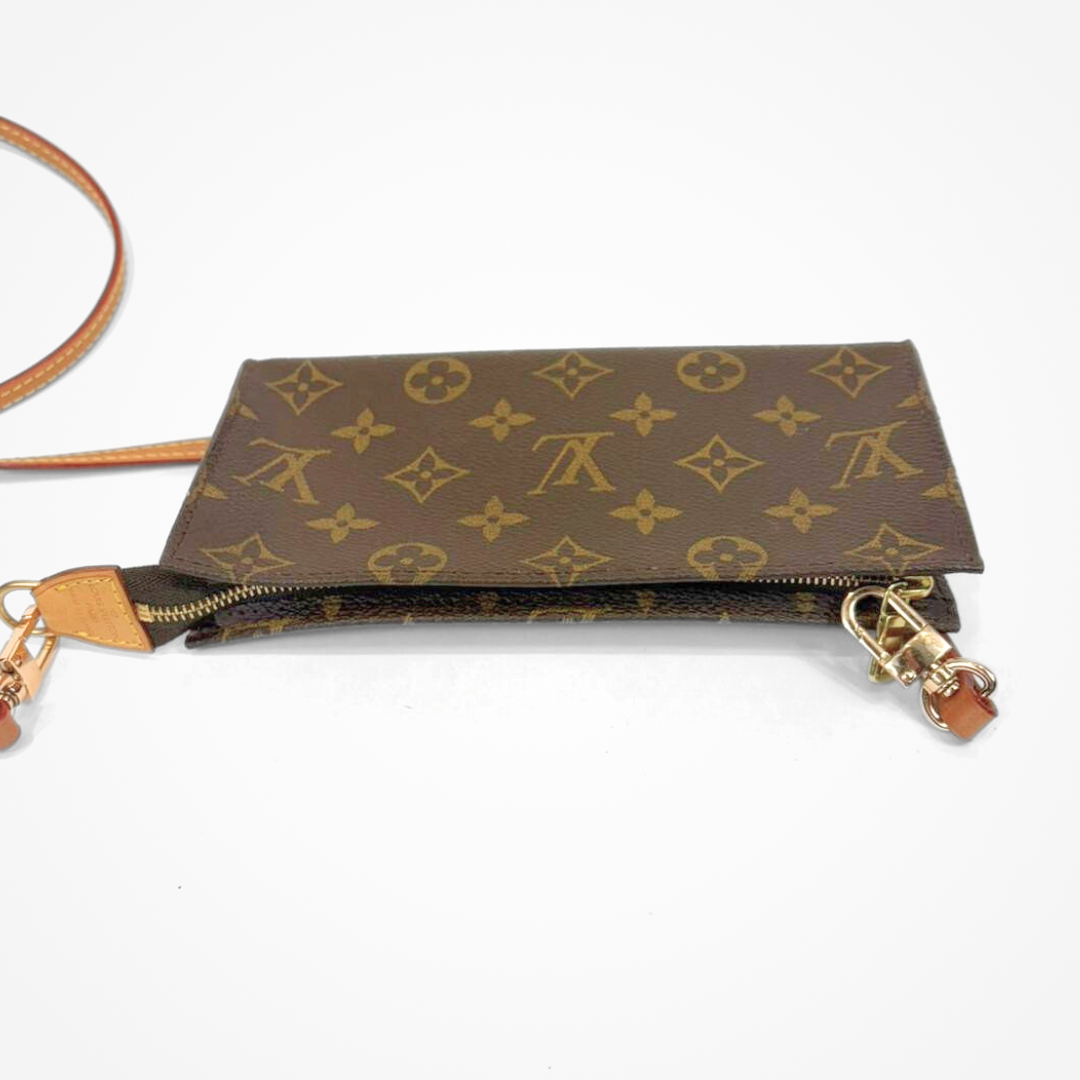 LV pouch with monogram pattern on a white background