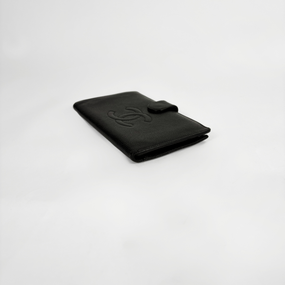 Chanel Wallet large Caviar on a white background