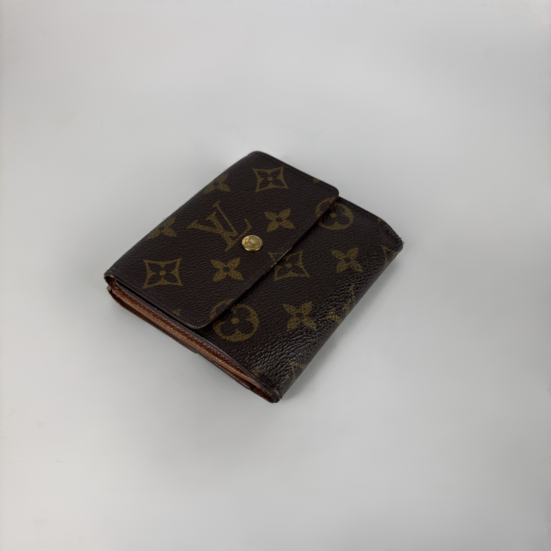 Louis Vuitton Druk Wallet on white background