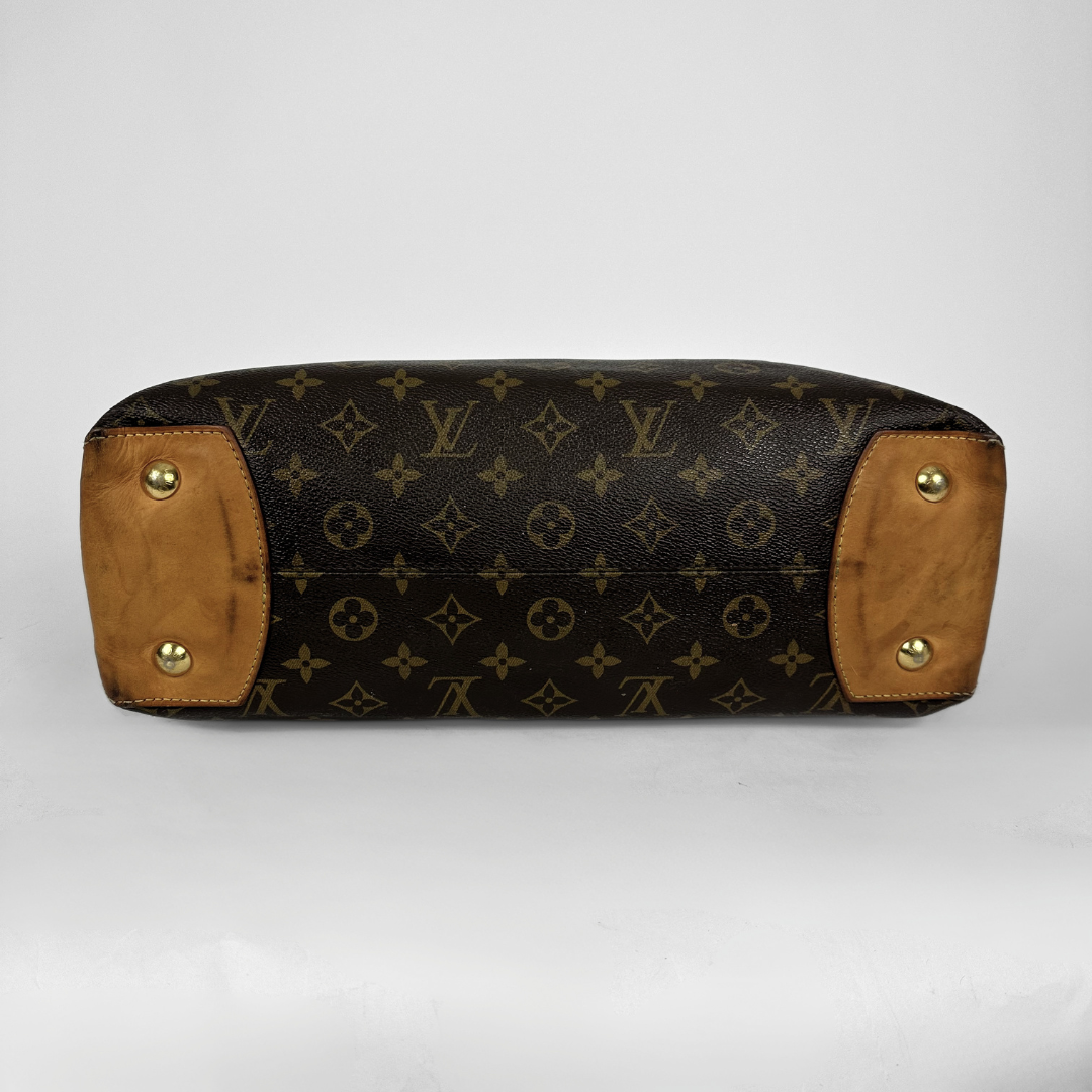 Louis Vuitton monogram canvas shoulder bag with tan leather trim and gold-tone hardware, shown against a plain light gray background.