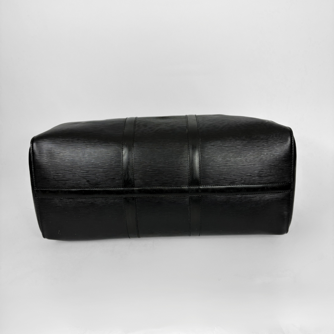 Black leather clutch bag on a white background