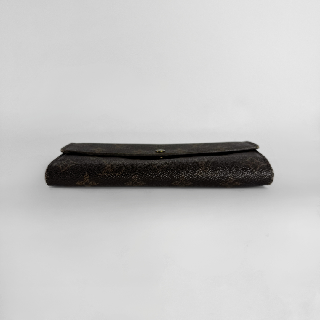 Louis Vuitton wallet on white background 