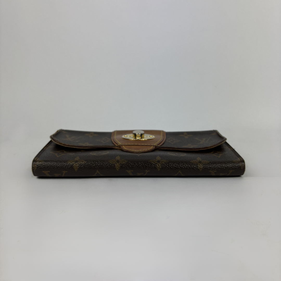 Louis Vuitton Wallet in front of white background