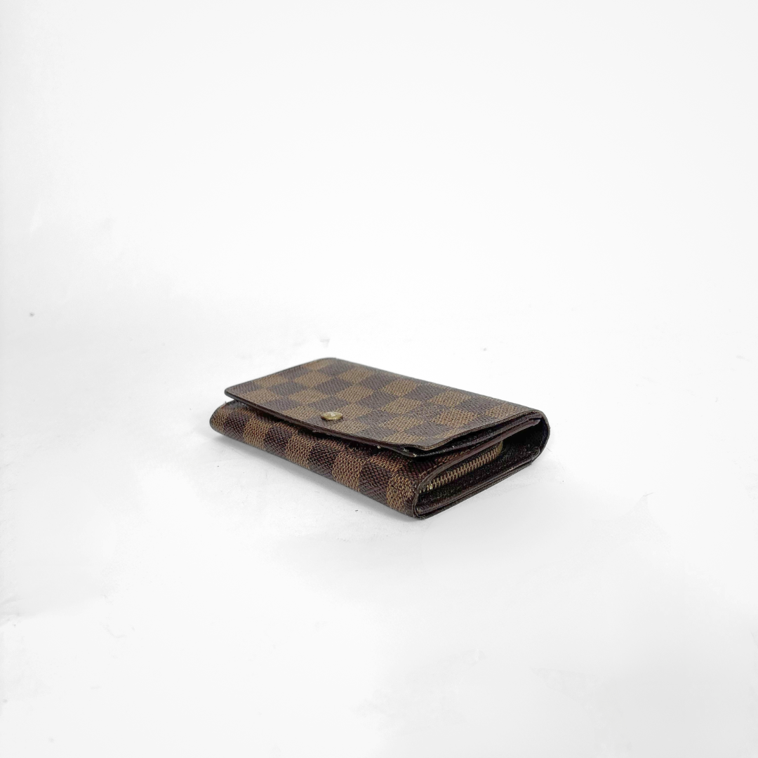 Brown checkered LV wallet with gold accents on a white background