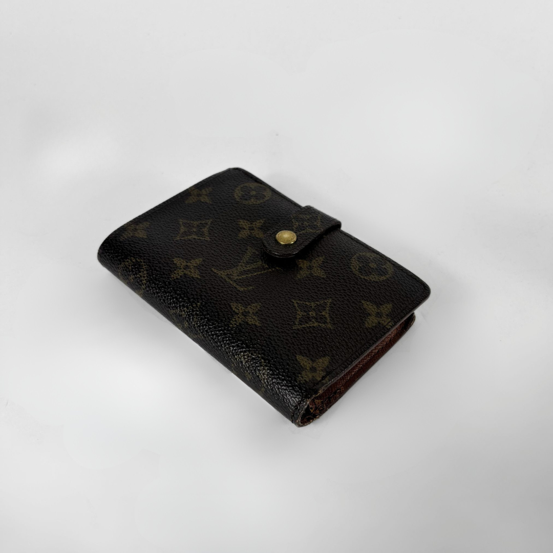 Louis Vuitton Monogram Clip Wallet on a white background