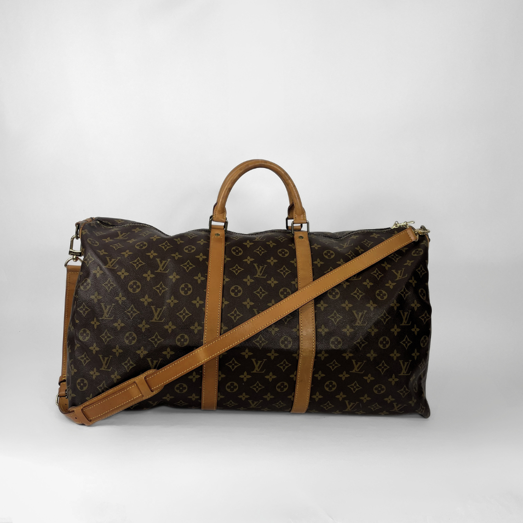 Louis Vuitton Keepall 60 Strap on a white background