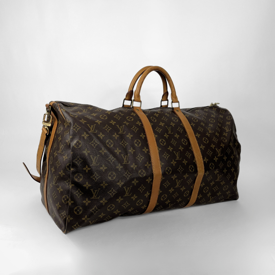 Louis Vuitton Keepall 60 Strap on a white background