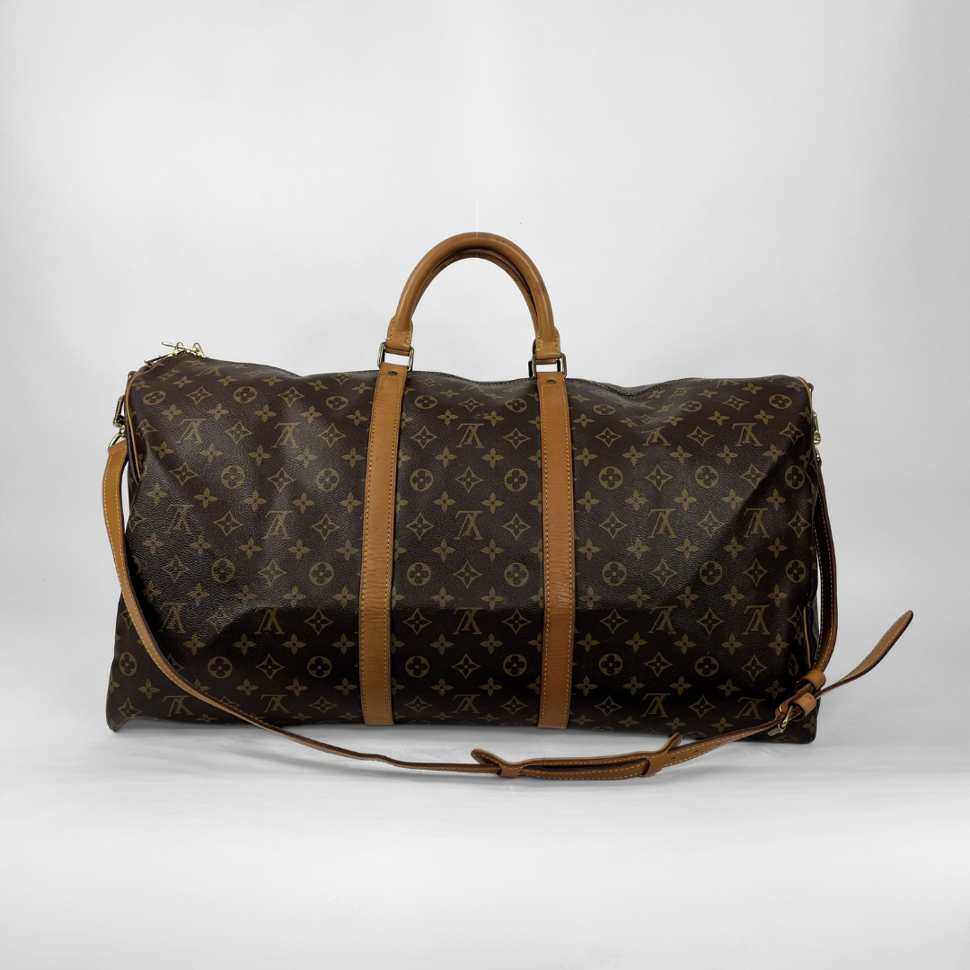 Louis Vuitton Keepall 60 Strap on a white background