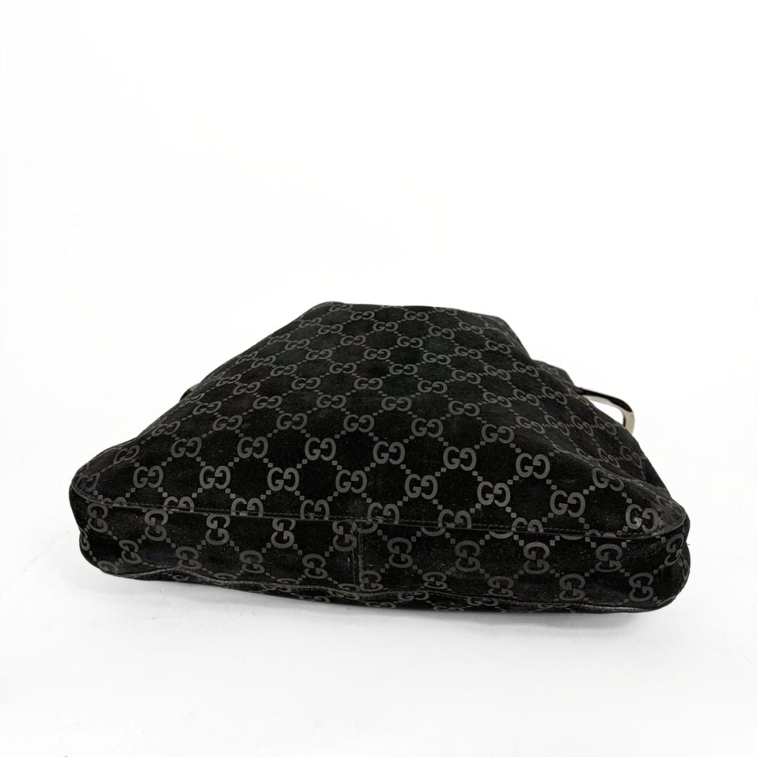 Black GG patterned pouch on a white background
