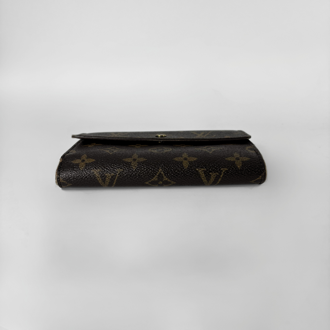Louis Vuitton International Wallet Medium on a white background
