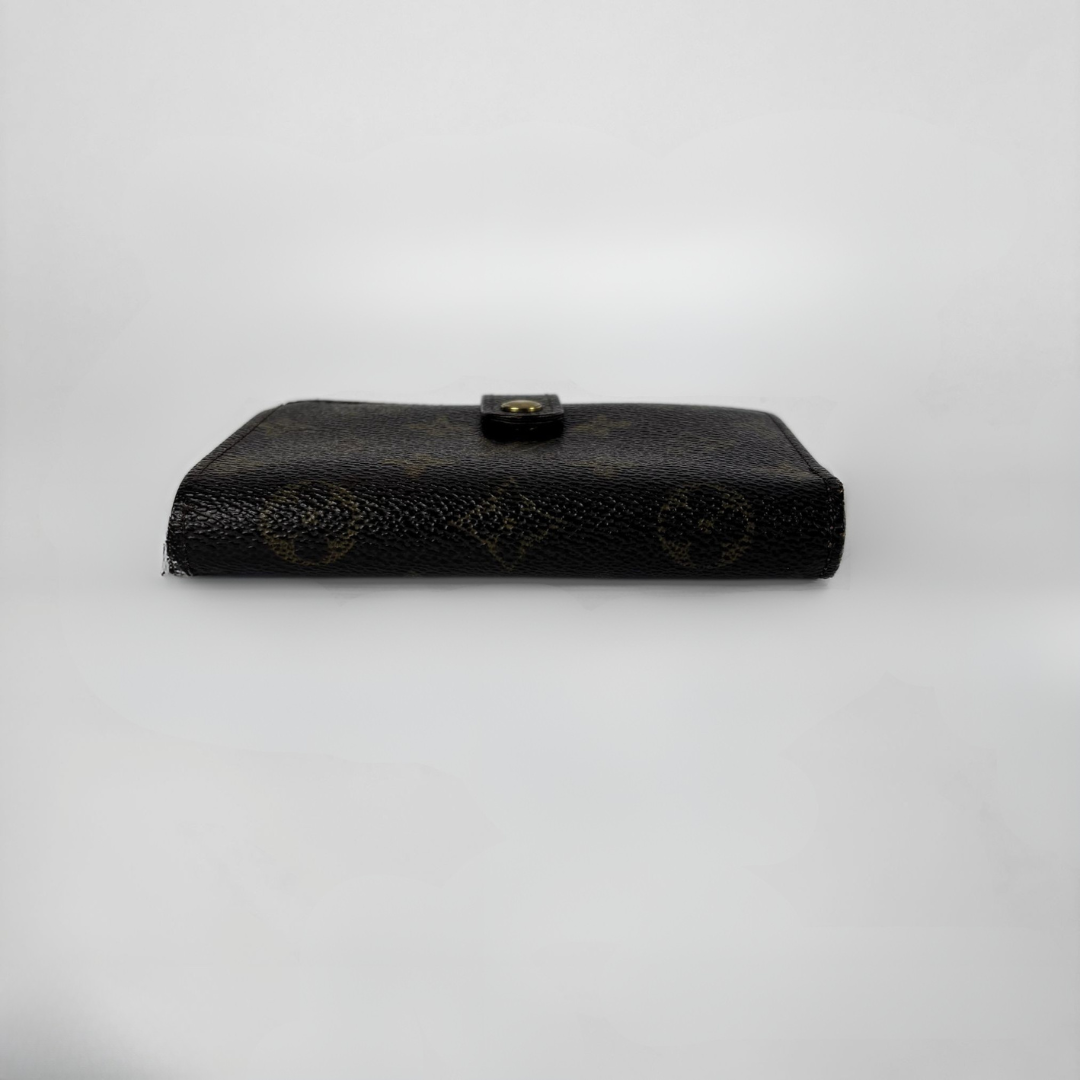 Louis Vuitton Monogram Clip Wallet on a white background