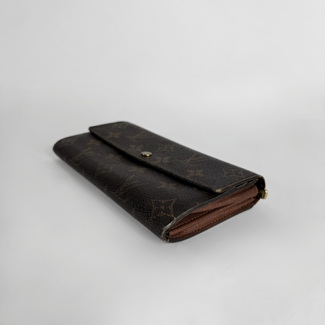 Louis Vuitton wallet on white background