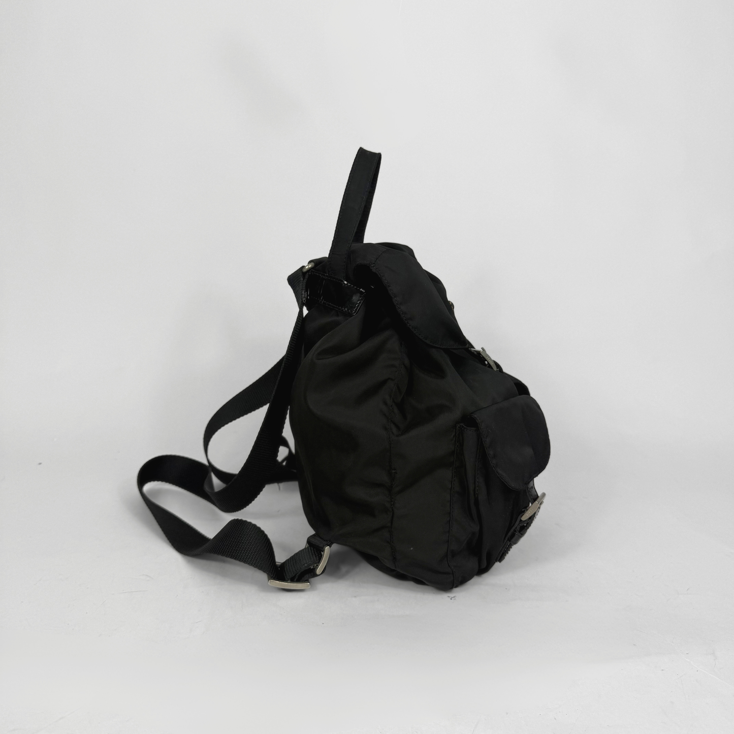 Black backpack on a white background