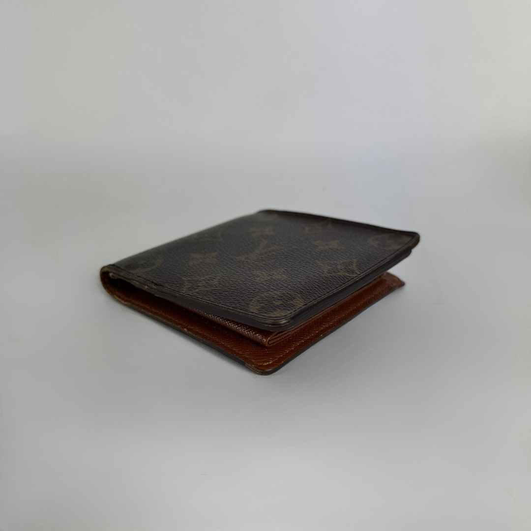 Louis Vuitton Flap Wallet on a white background