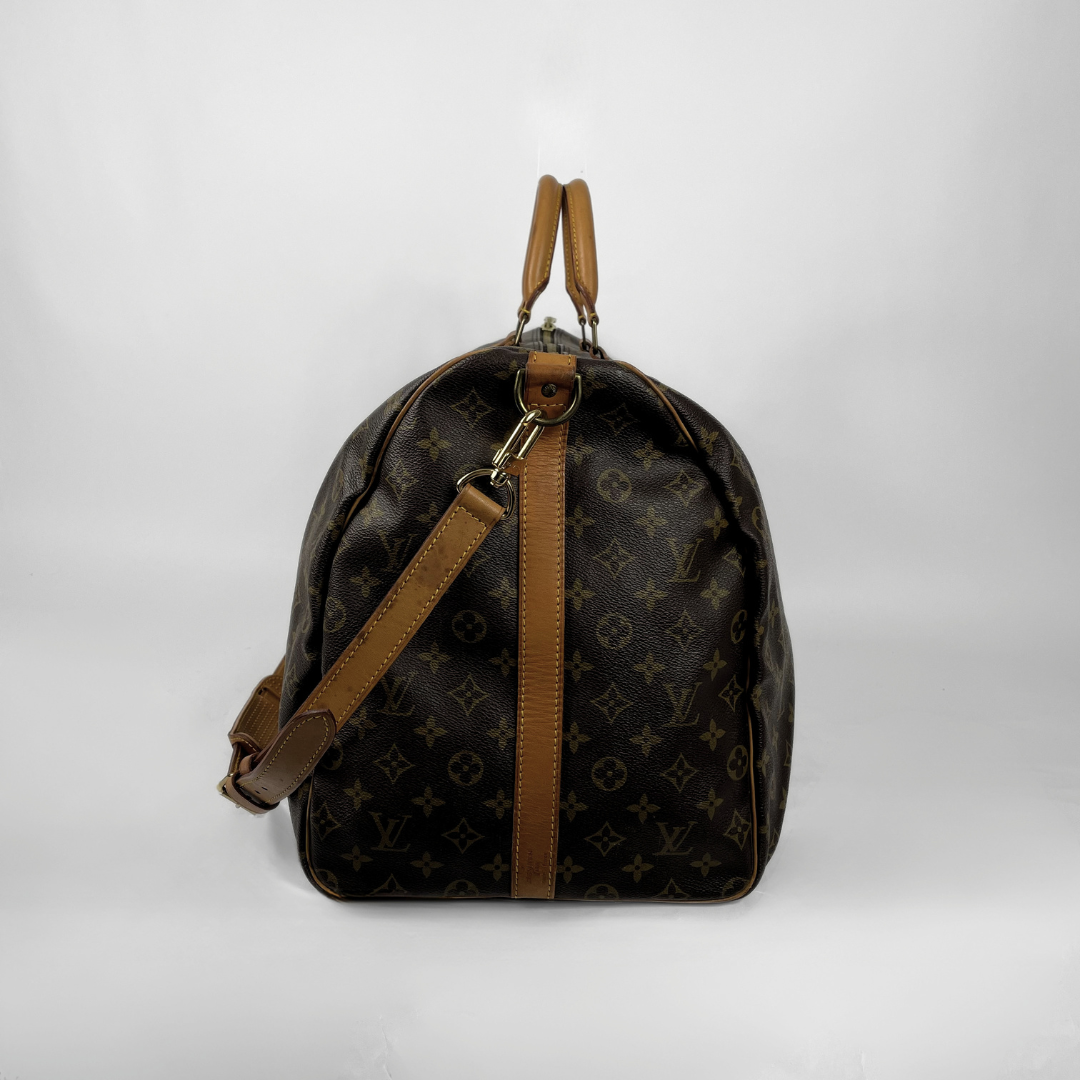 Louis Vuitton Keepall 60 Strap on a white background