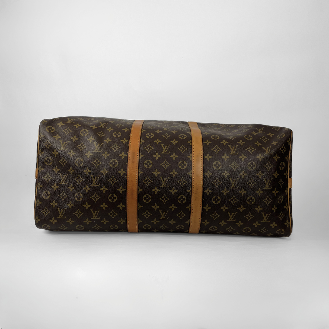 Louis Vuitton Keepall 60 Strap on a white background