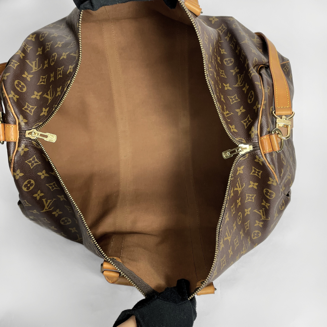 Louis Vuitton Keepall 60 Strap on a white background