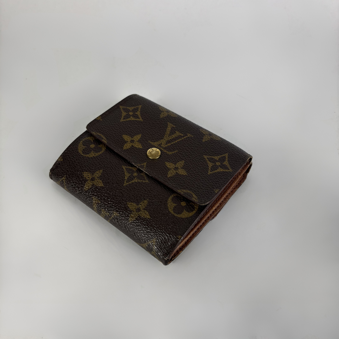 Louis Vuitton Druk Wallet on white background