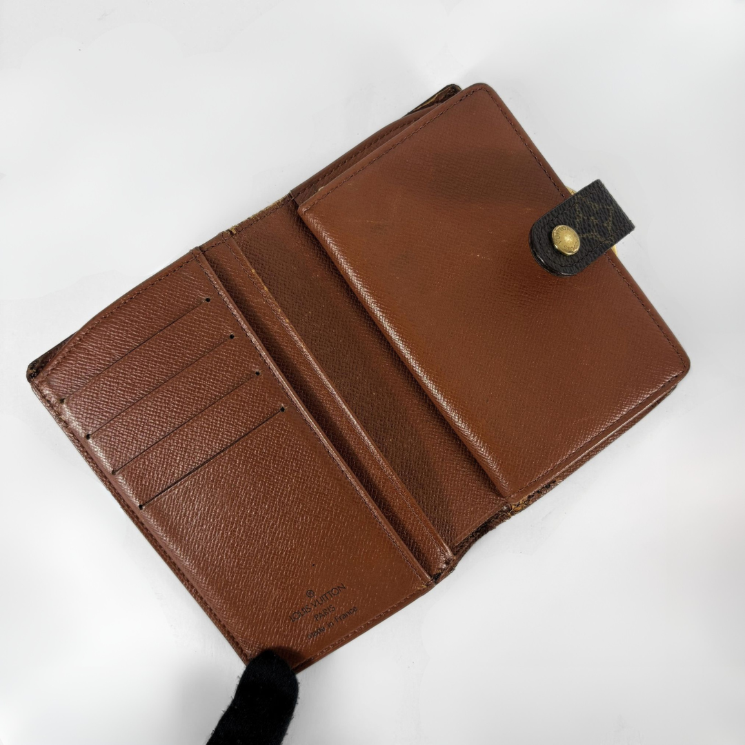 Louis Vuitton Monogram Clip Wallet on a white background